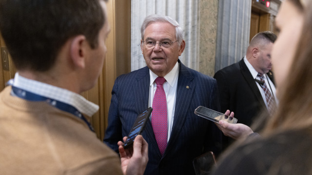 Democratic Senator of New Jersey Bob Menendez (C) speaks to members of the news media outside the Senate chamber during a Senate vote on Capitol Hill in Washington, DC, USA, 04 December 2023